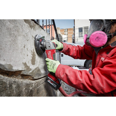 Milwaukee 2880-20 M18 FUEL™ 4-1/2" / 5" Grinder Paddle Switch, No-Lock - in use