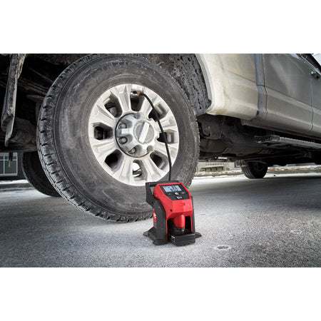 Milwaukee 2475-21XC M12™ Compact Inflator Kit - in use
