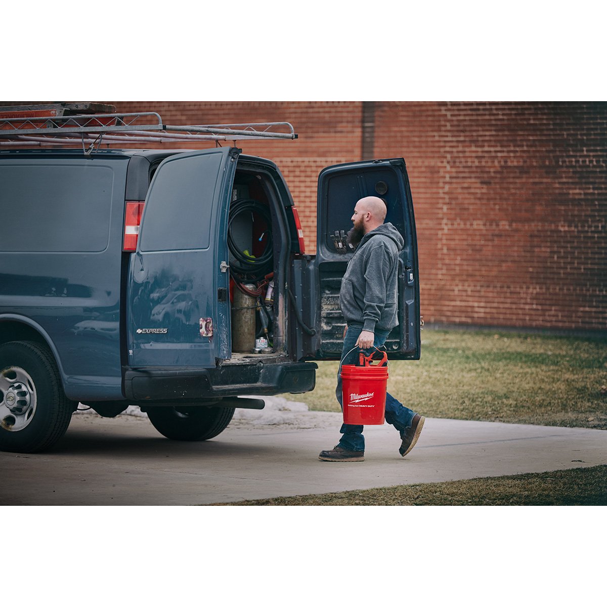 Milwaukee 2571-21 M12™ Drain Snake Kit - in use