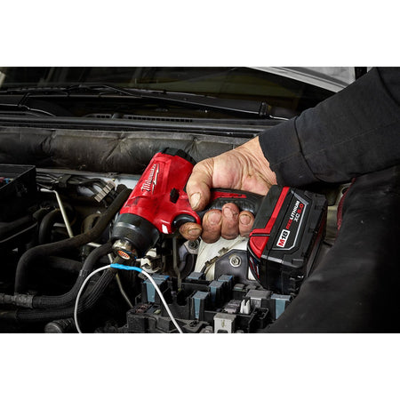 Milwaukee 2688-20 M18™ Compact Heat Gun - in use