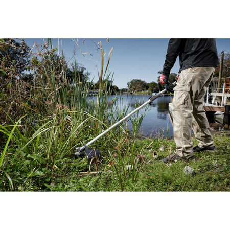 Milwaukee 49-16-2738 M18 FUEL™ QUIK-LOK™ Brush Cutter Attachment - in use