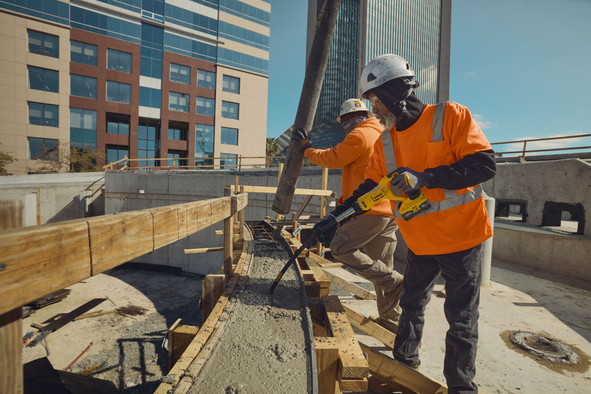 DEWALT DCE531B 20V MAX* Pencil Vibrator, Tool Only - in use