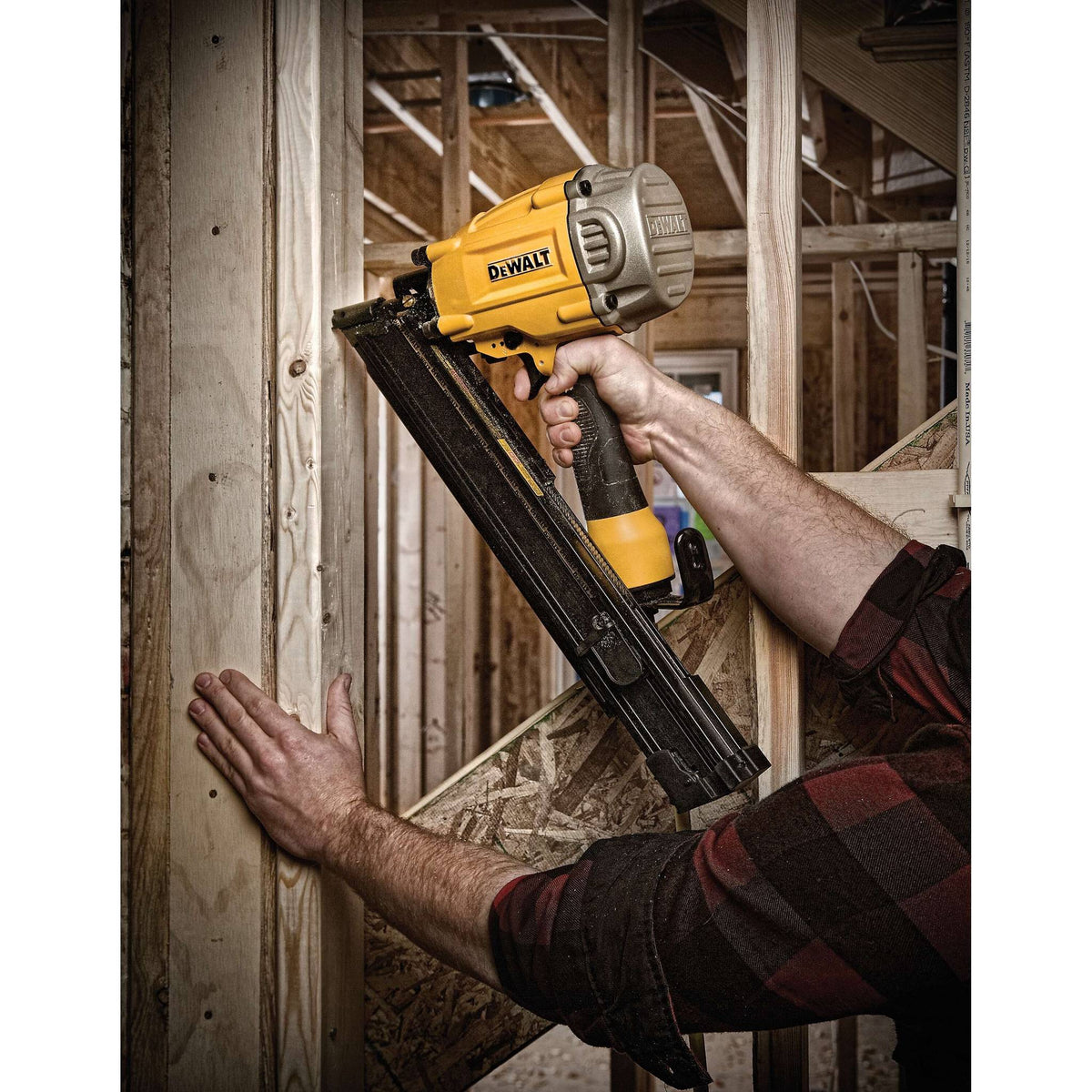 DEWALT DWF83PT 30 DEGREE PAPER TAPE FRAMING NAILER - in use