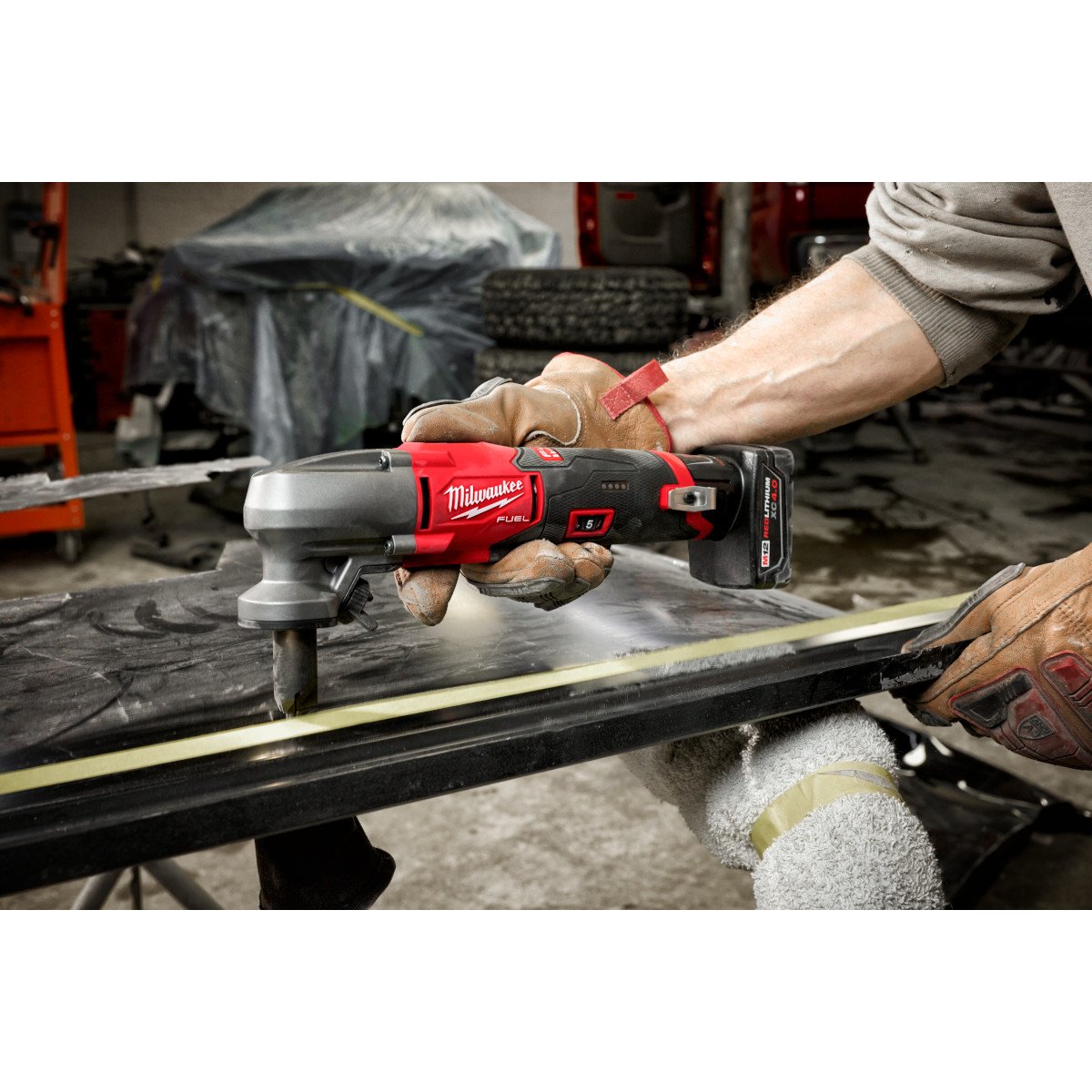 Milwaukee 2476-20 M12 FUEL™ 16 Gauge Variable Speed Nibbler - in use