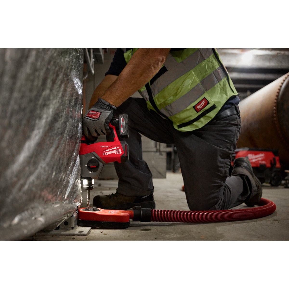 Milwaukee 2508-20 M12 FUEL™ 5/8” SDS Plus Rotary Hammer - in use