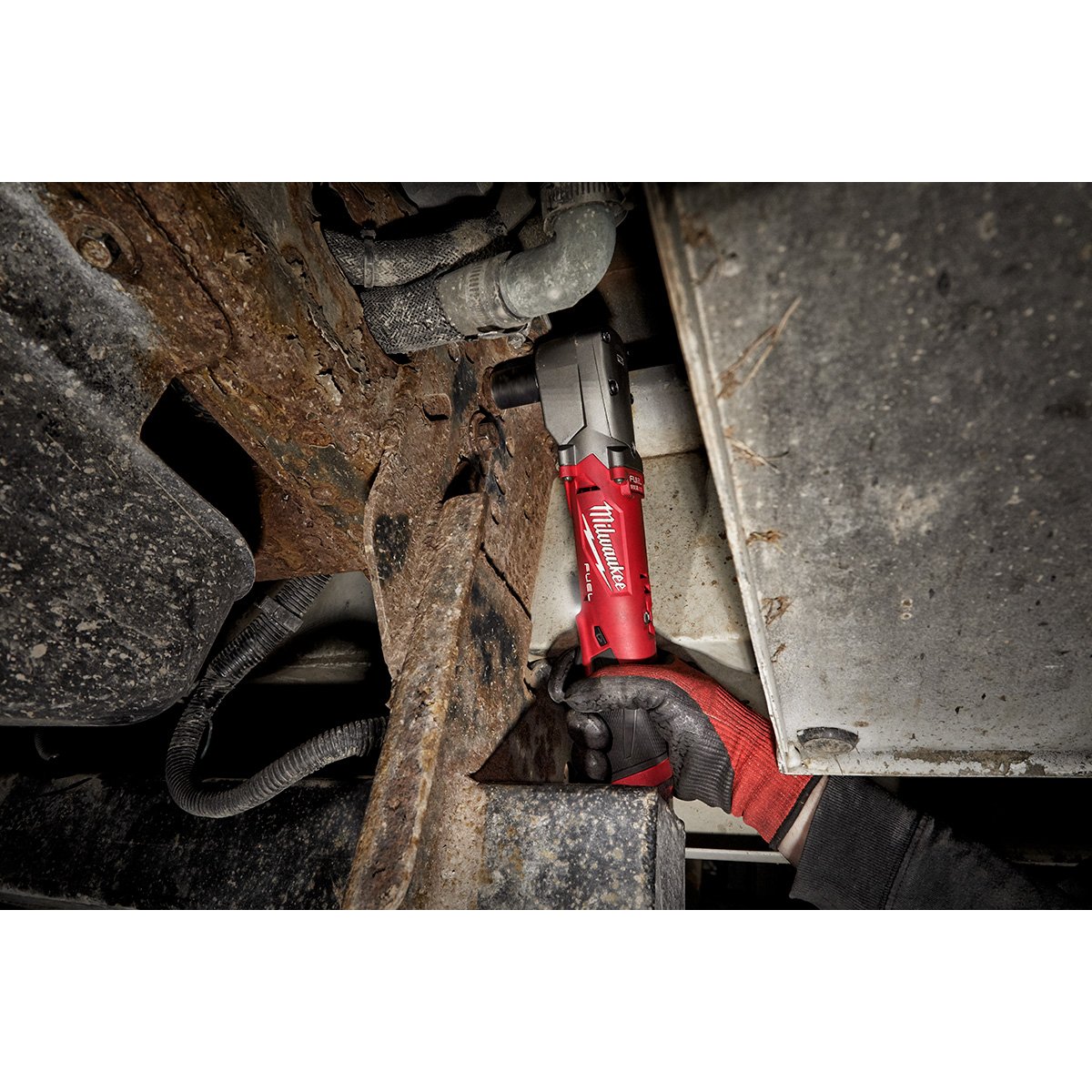 Milwaukee 2564-22 M12 FUEL™ 3/8" Right Angle Impact Wrench Kit - in use