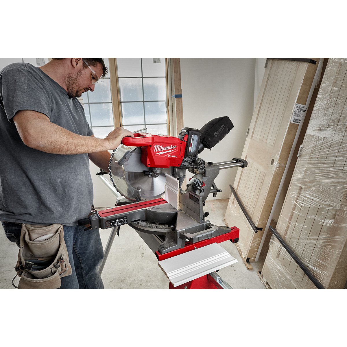 Milwaukee 2739-20 M18 FUEL™ 12 in. Dual Bevel Sliding Compound Miter Saw - in use