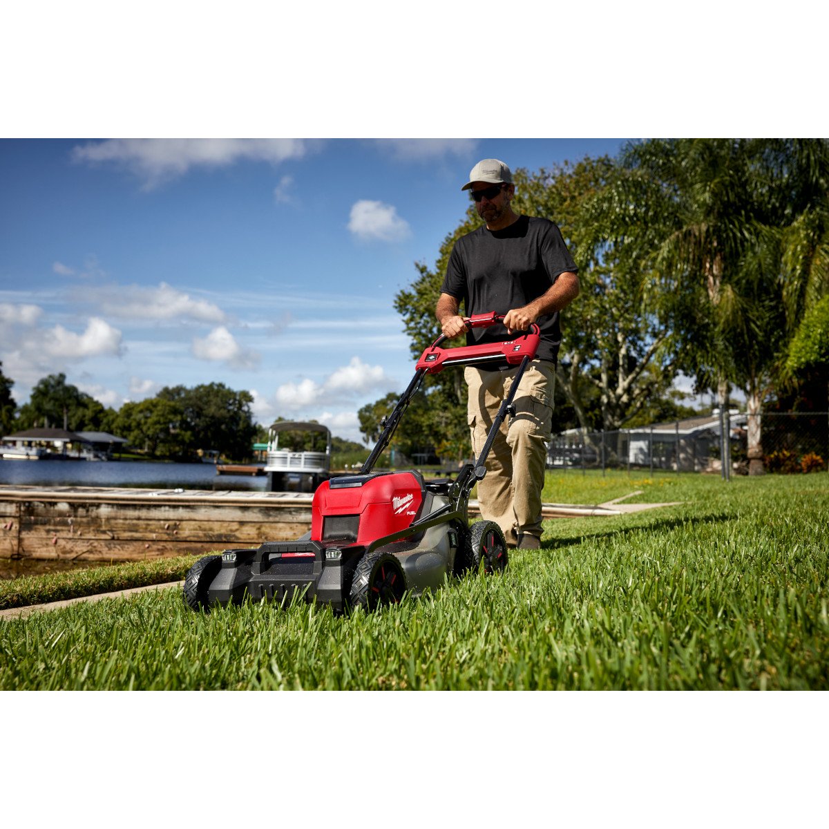 Milwaukee 2823-22HD M18 FUEL™ 21" Self-Propelled Dual Battery Mower Kit - in use