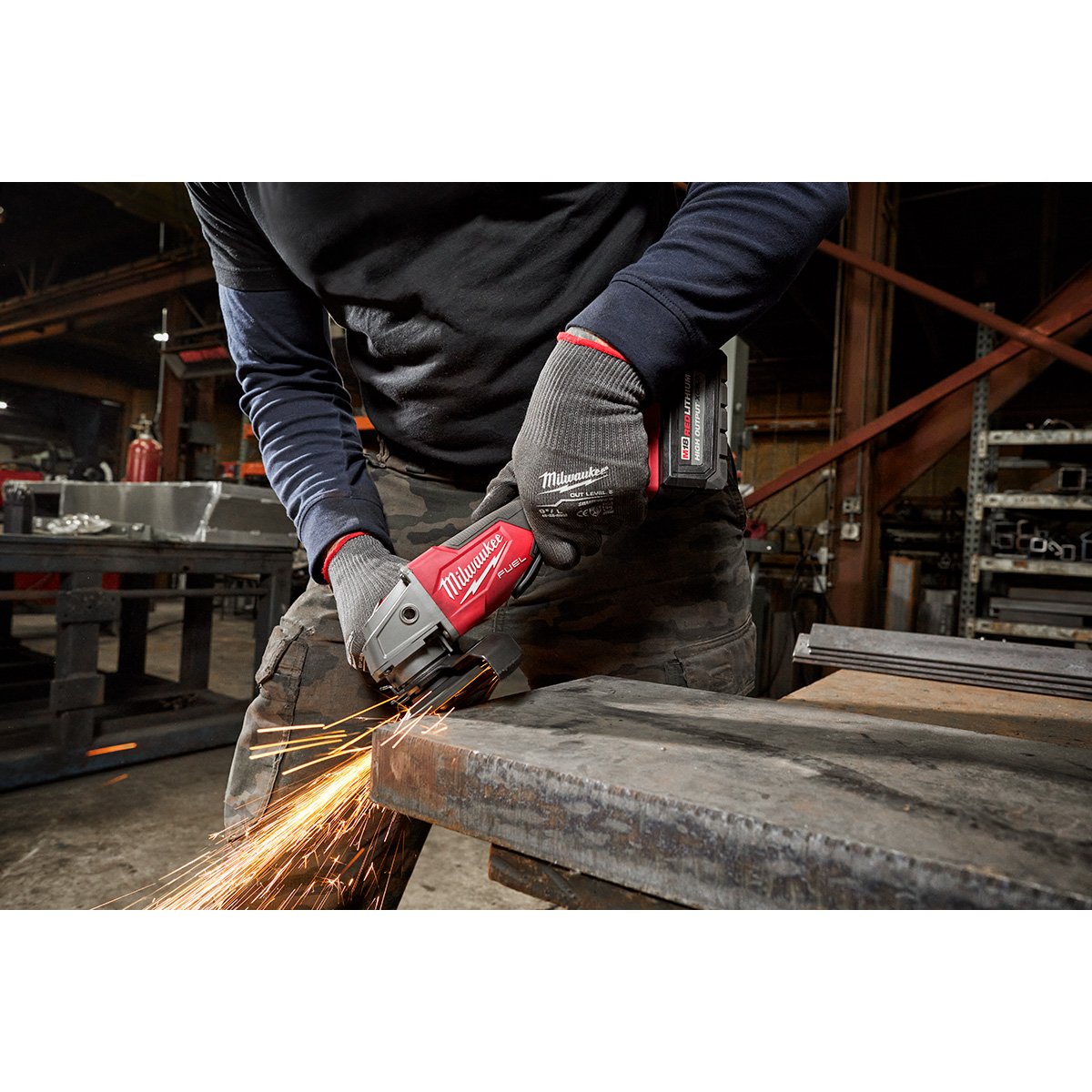 Milwaukee 2880-22 M18 FUEL™ 4-1/2" / 5" Grinder Paddle Switch, No-Lock Kit - in use