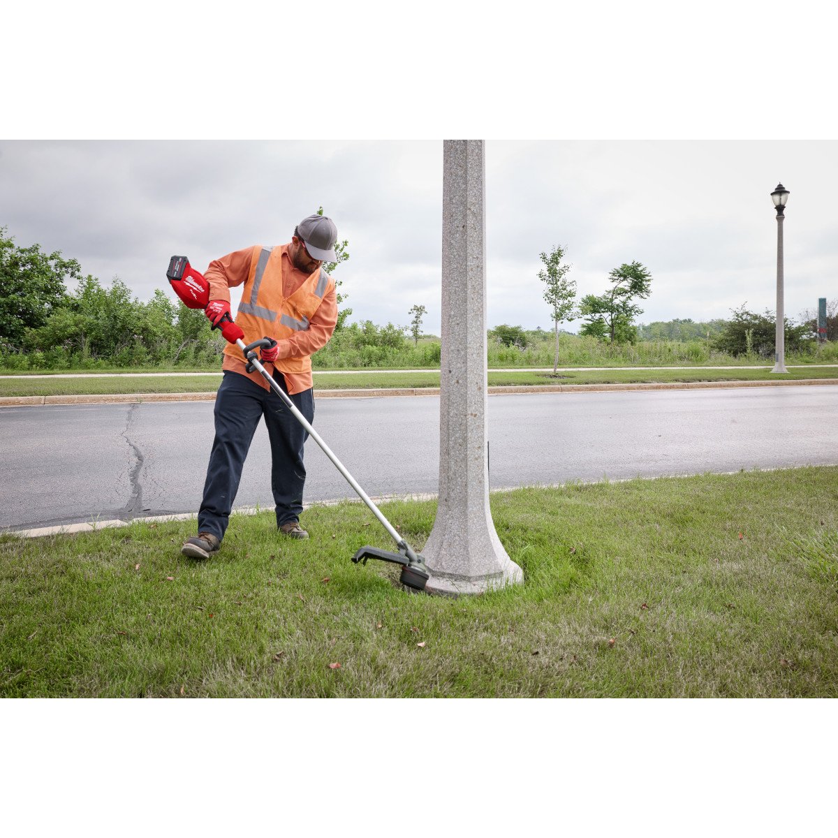 Milwaukee 3046-20 M18 FUEL™ 16" String Trimmer - in use