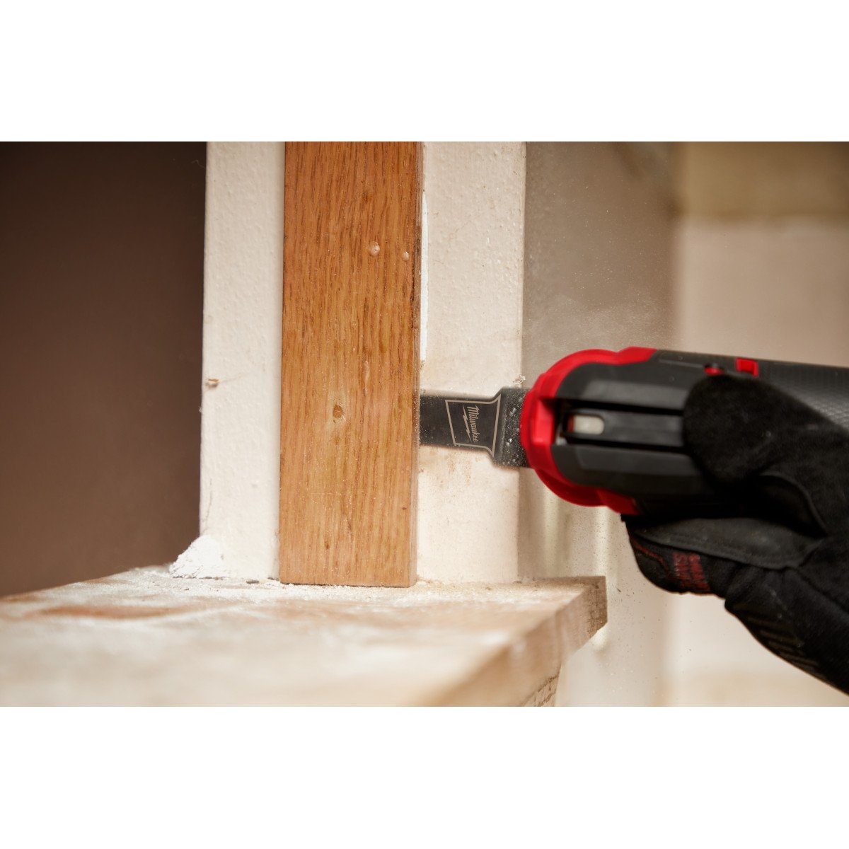 Milwaukee 49-25-1251 OPEN-LOK™ 1-1/8" TITANIUM CHARGED™ Bi-Metal Thin Metal Multi-Tool Blade - in use