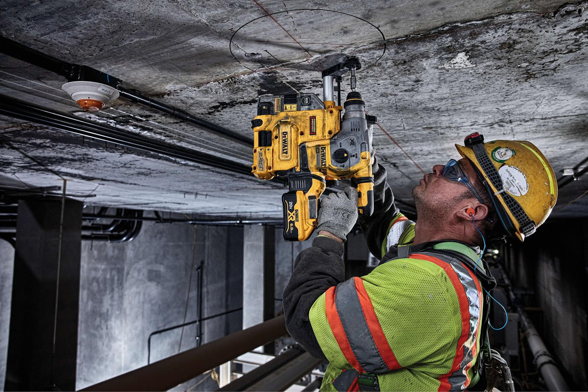 DEWALT DCH293B 20V Max* XR Brushless 1-1/8'' L-Shape Rotary Hammer (Tool Only) - in use
