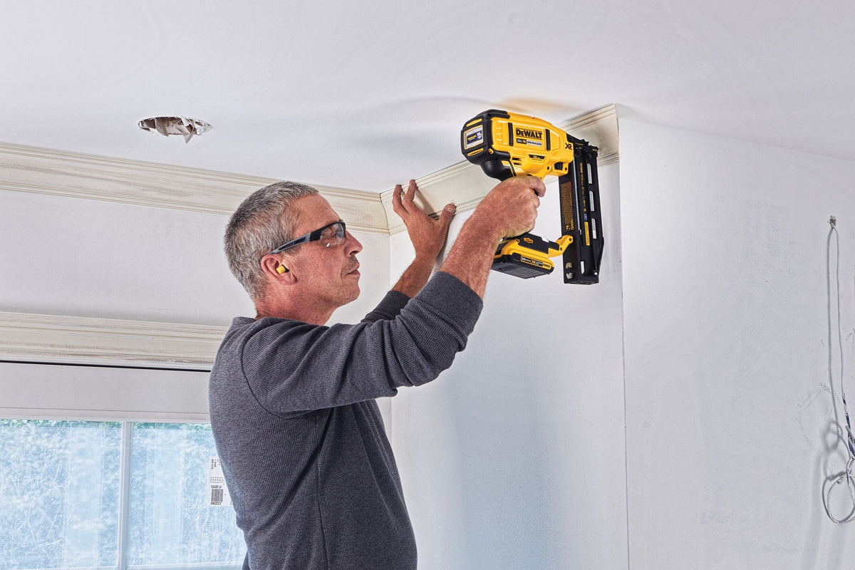DEWALT DCN662D1 20V MAX 16GA ST FINISH NAILER KIT - in use