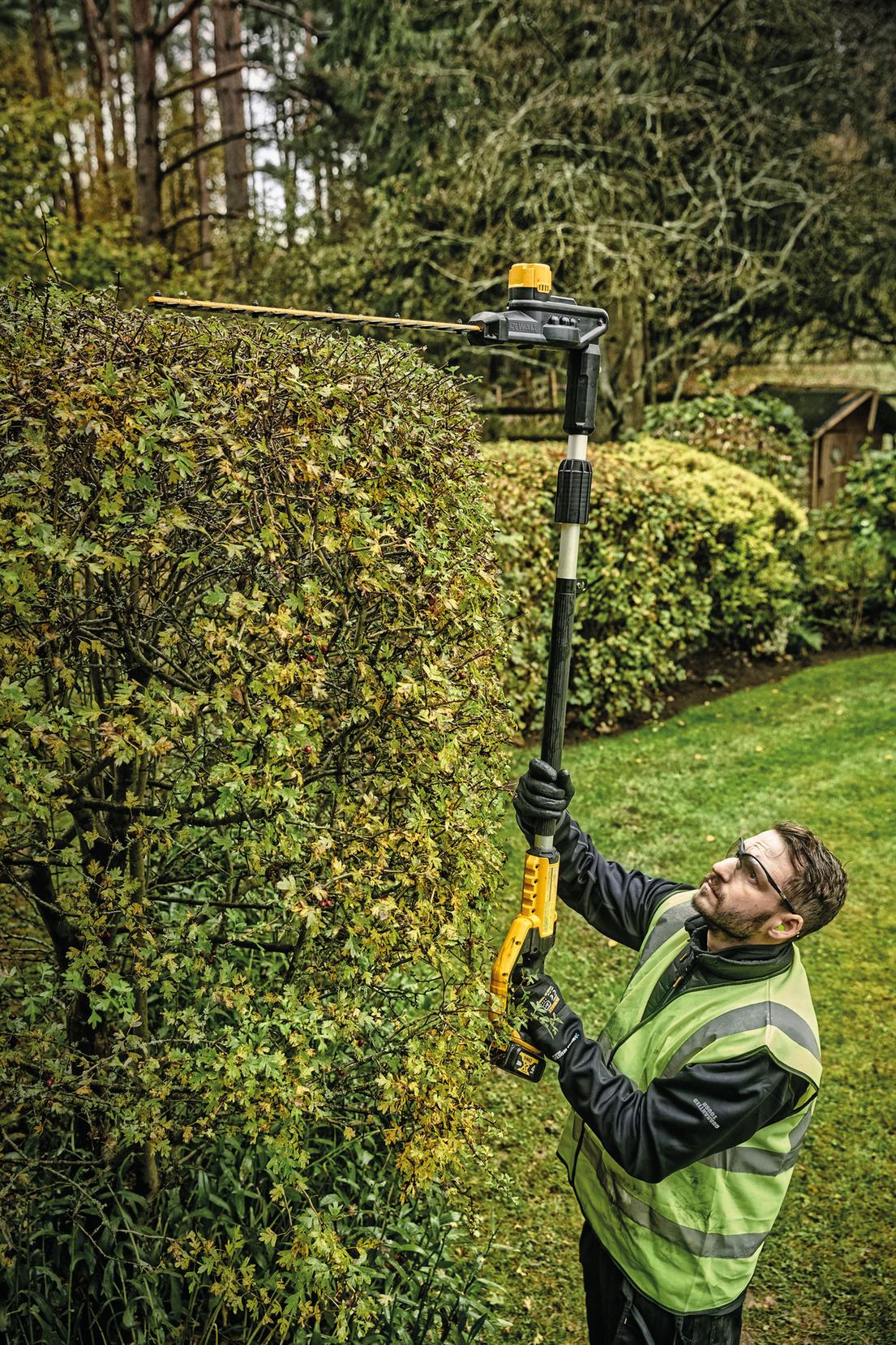 DEWALT DCPH820B 20V MAX Pole Hedge Trimmer - in use