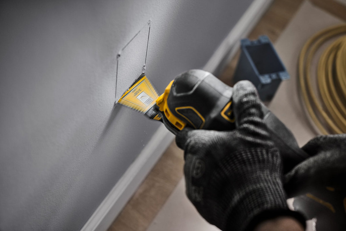 DEWALT DWA4283B Oscillating 2 1/8In 3-Sided Bimetal 10 Piece - in use