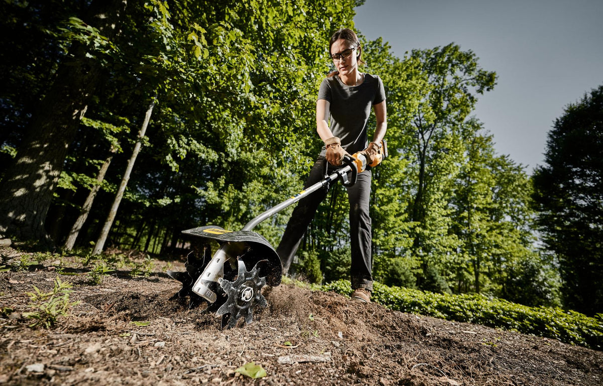 DEWALT DWOAS3CL Cultivator Attachment - in use