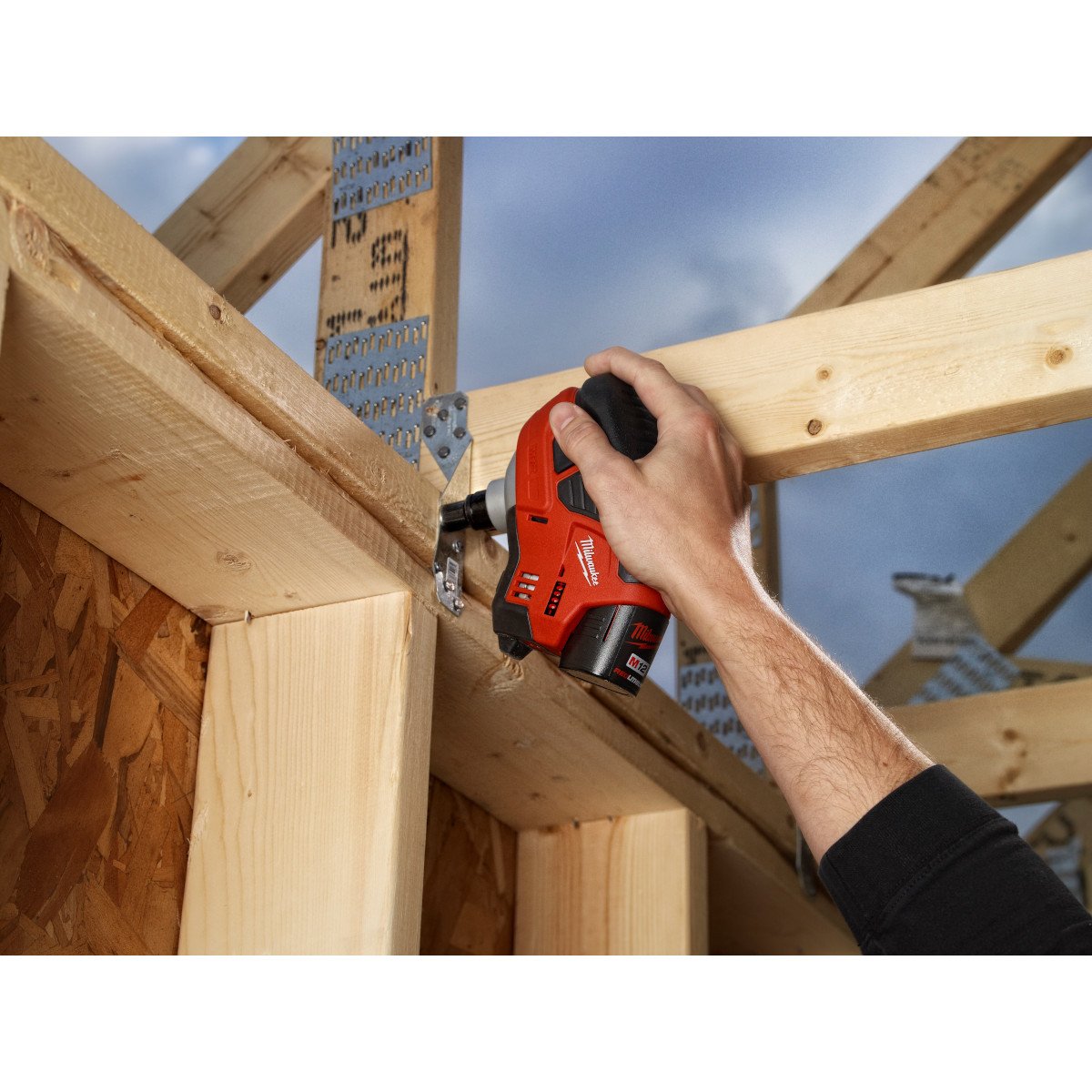 Milwaukee 2458-21 M12™ Cordless Lithium-Ion Palm Nailer Kit - in use