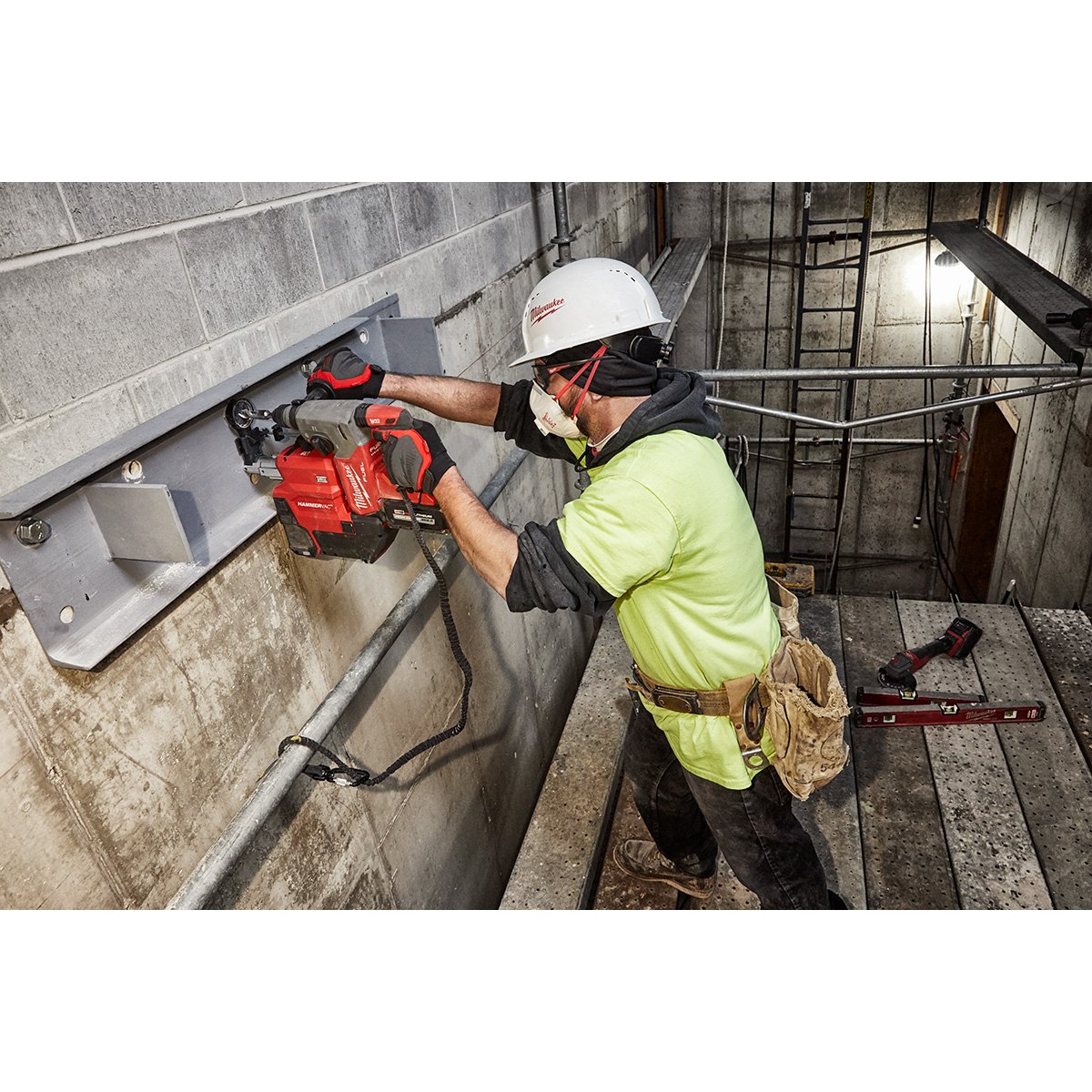 Milwaukee 2912-22 M18 FUEL™ 1 in SDS Plus Rotary Hammer Kit - in use