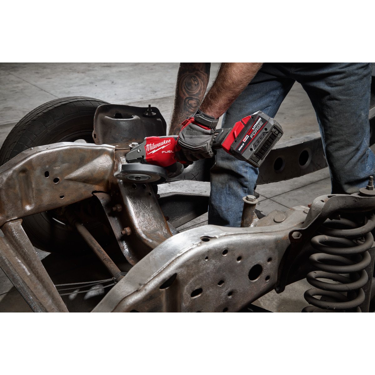 Milwaukee 3670-20 M18 FUEL™ 4-1/2"-6" Braking Grinder, Paddle Switch - in use