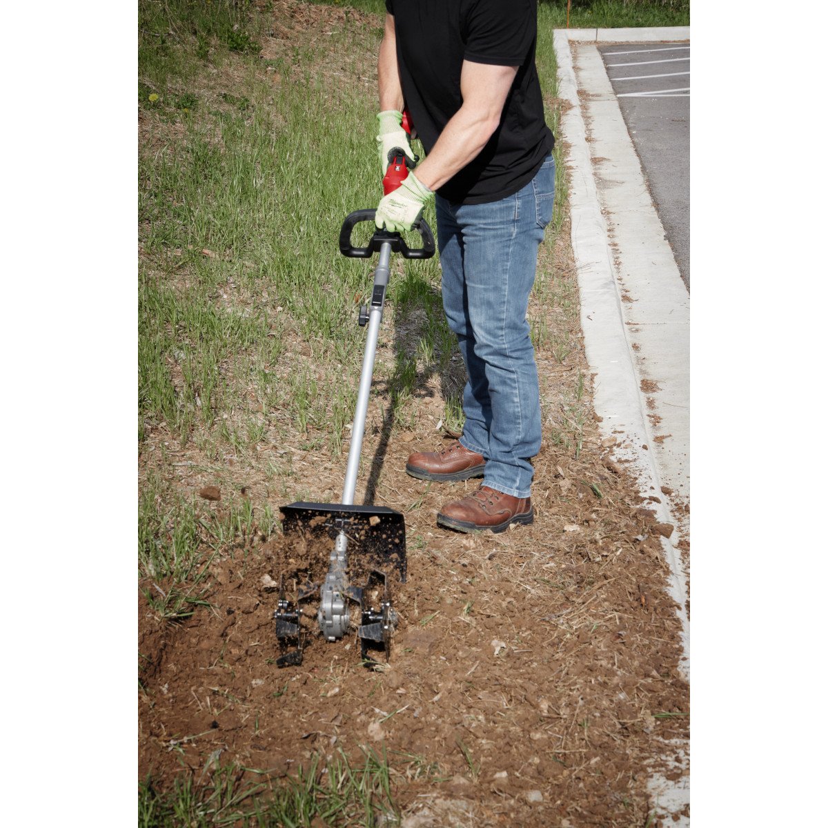 Milwaukee 49-16-2739 M18 FUEL™ QUIK-LOK™ Cultivator Attachment - in use