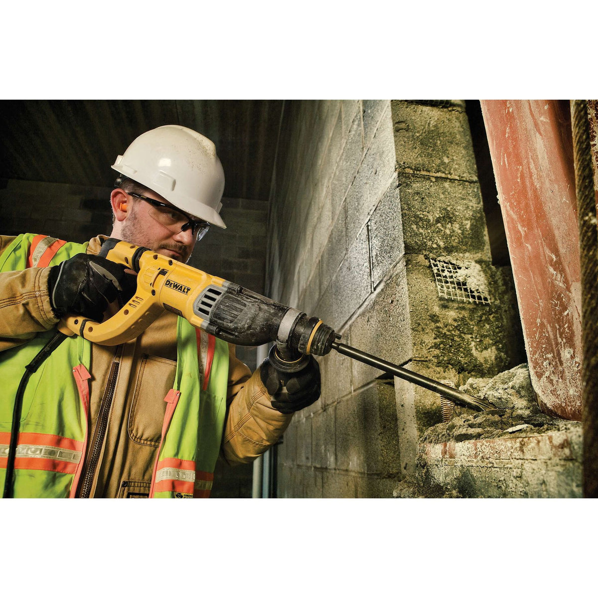 DEWALT D25263K Rotary Hammer Drill Kit with Shocks, D-Handle, SDS, 1-1/8-Inch - in use