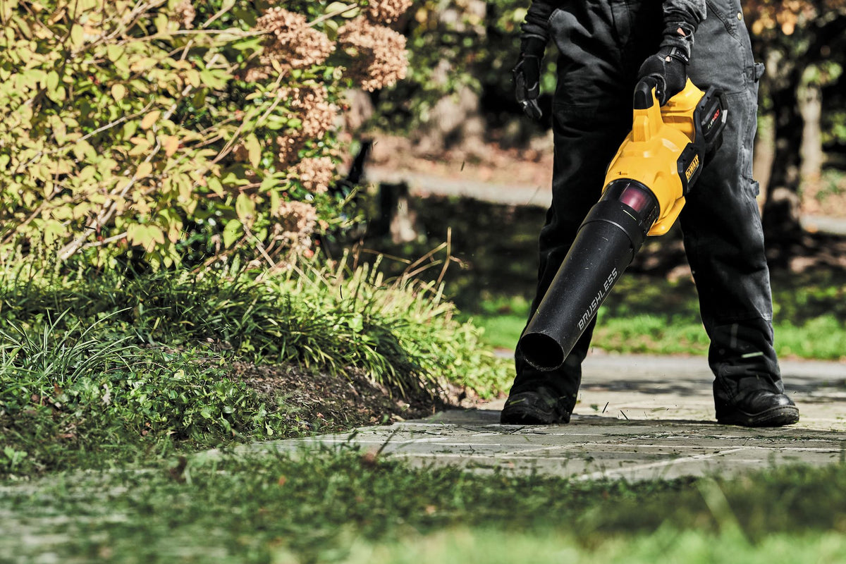 DEWALT DCBL772B 60V Max Flexvolt Brushless Cordless Handheld Axial Blower (Tool Only) - in use