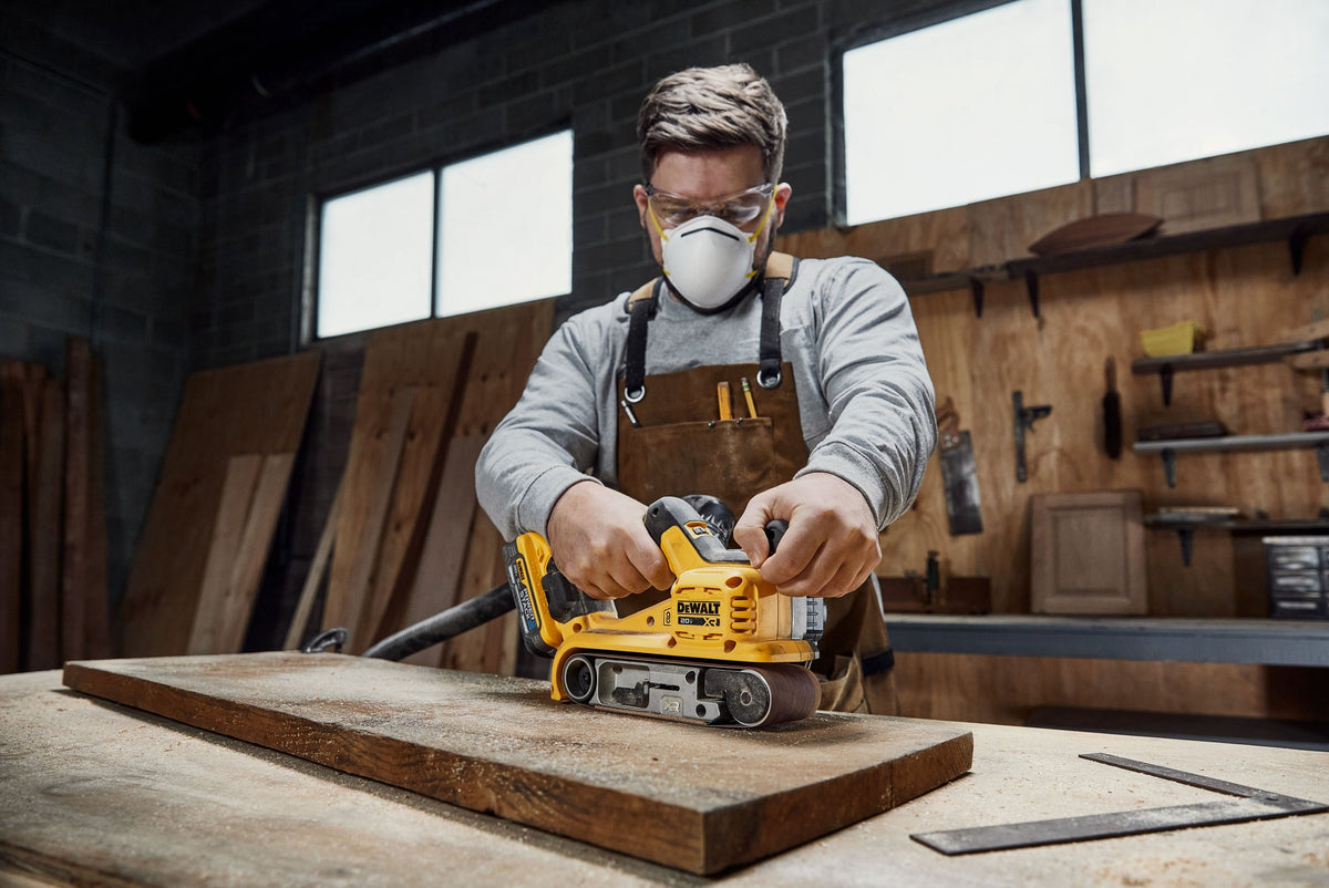 DEWALT DCW220B 20V MAX* XR® Brushless Cordless 3 in. x 21 in. Belt Sander (Tool Only) - in use