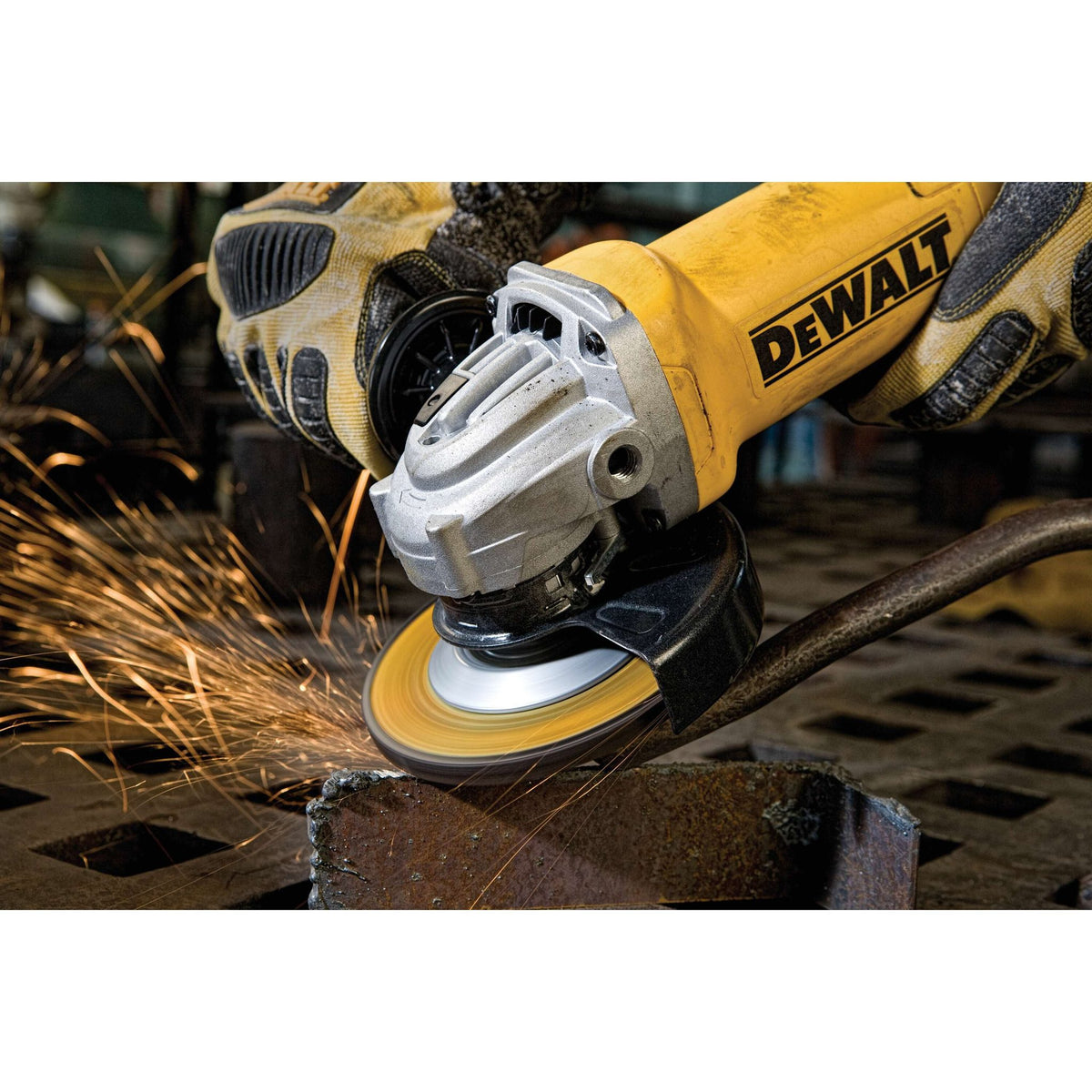 DEWALT DWE402 Angle Grinder Tool, Paddle Switch, 4-1/2-Inch, 11-Amp - in use