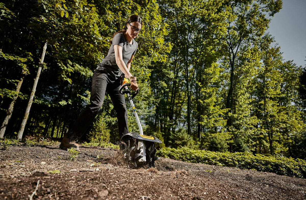 DEWALT DWOAS3CL Cultivator Attachment - in use