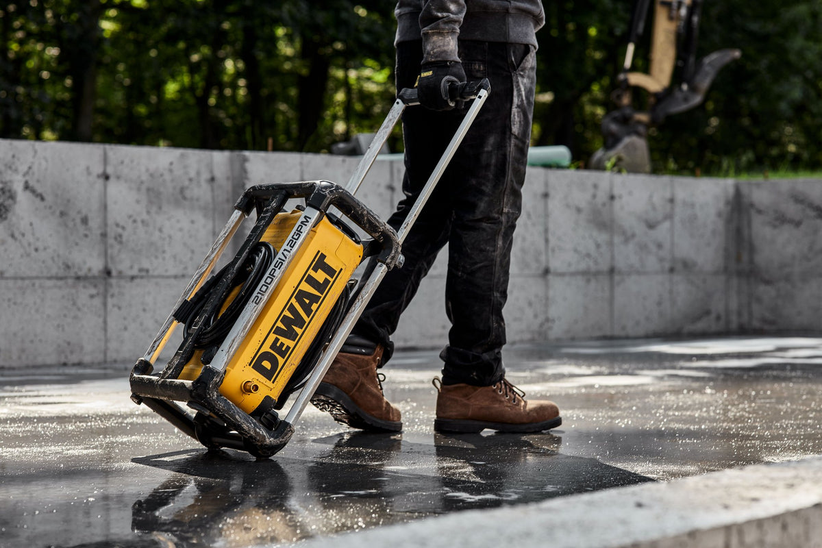 DEWALT DWPW2100 2,100 MAX psi* 1.2 gpm* 13 Amp Electric Jobsite Cold Water Pressure Washer - in use