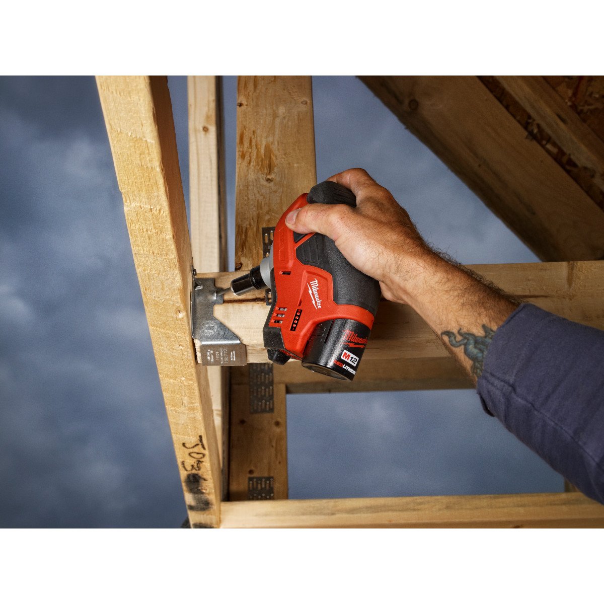 Milwaukee 2458-21 M12™ Cordless Lithium-Ion Palm Nailer Kit - in use