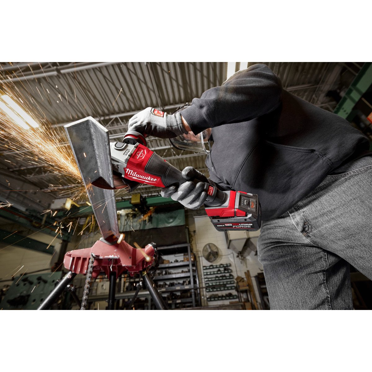 Milwaukee 3670-20 M18 FUEL™ 4-1/2"-6" Braking Grinder, Paddle Switch - in use
