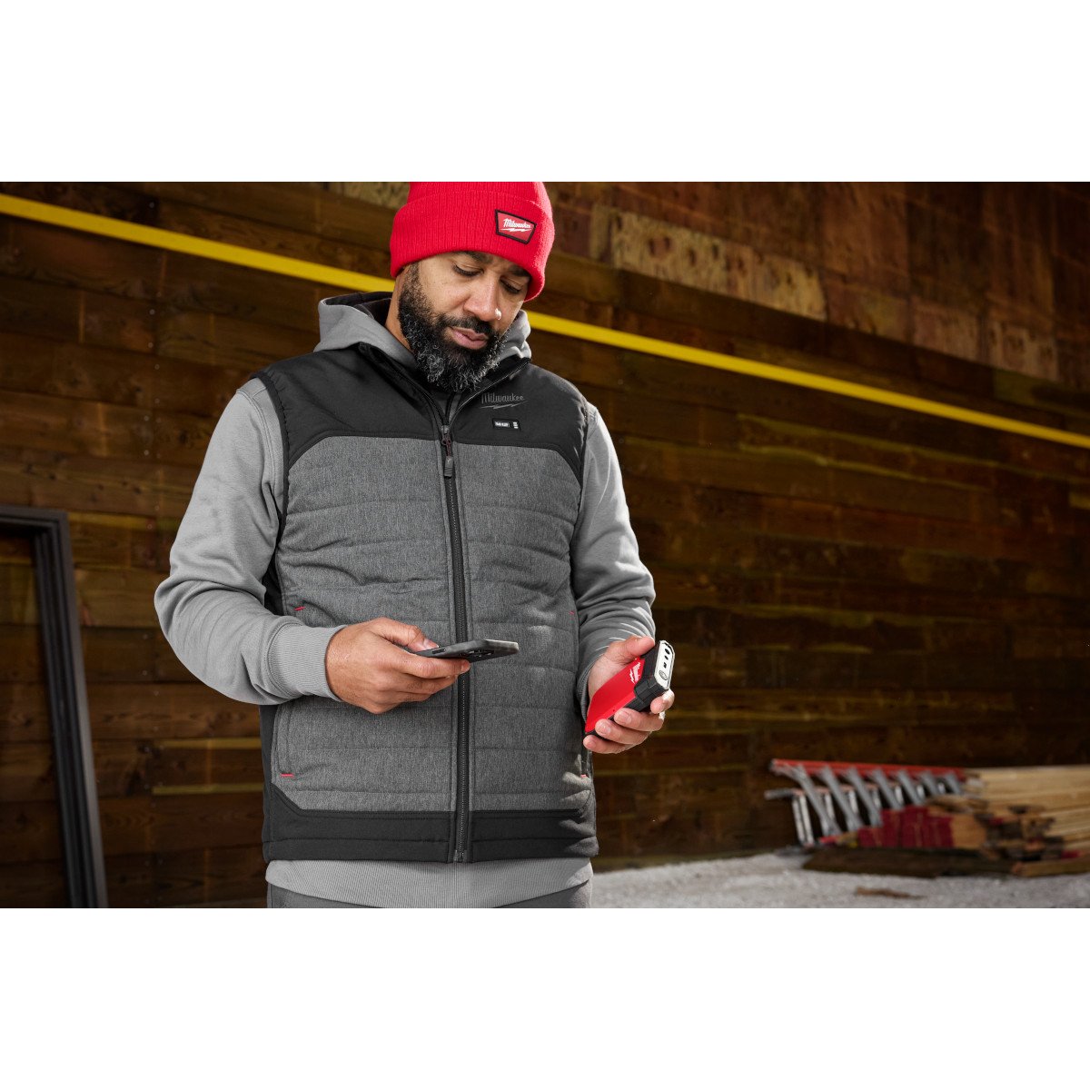 Milwaukee 48-11-2330 Heated Gear Power Source w/ App Control - in use