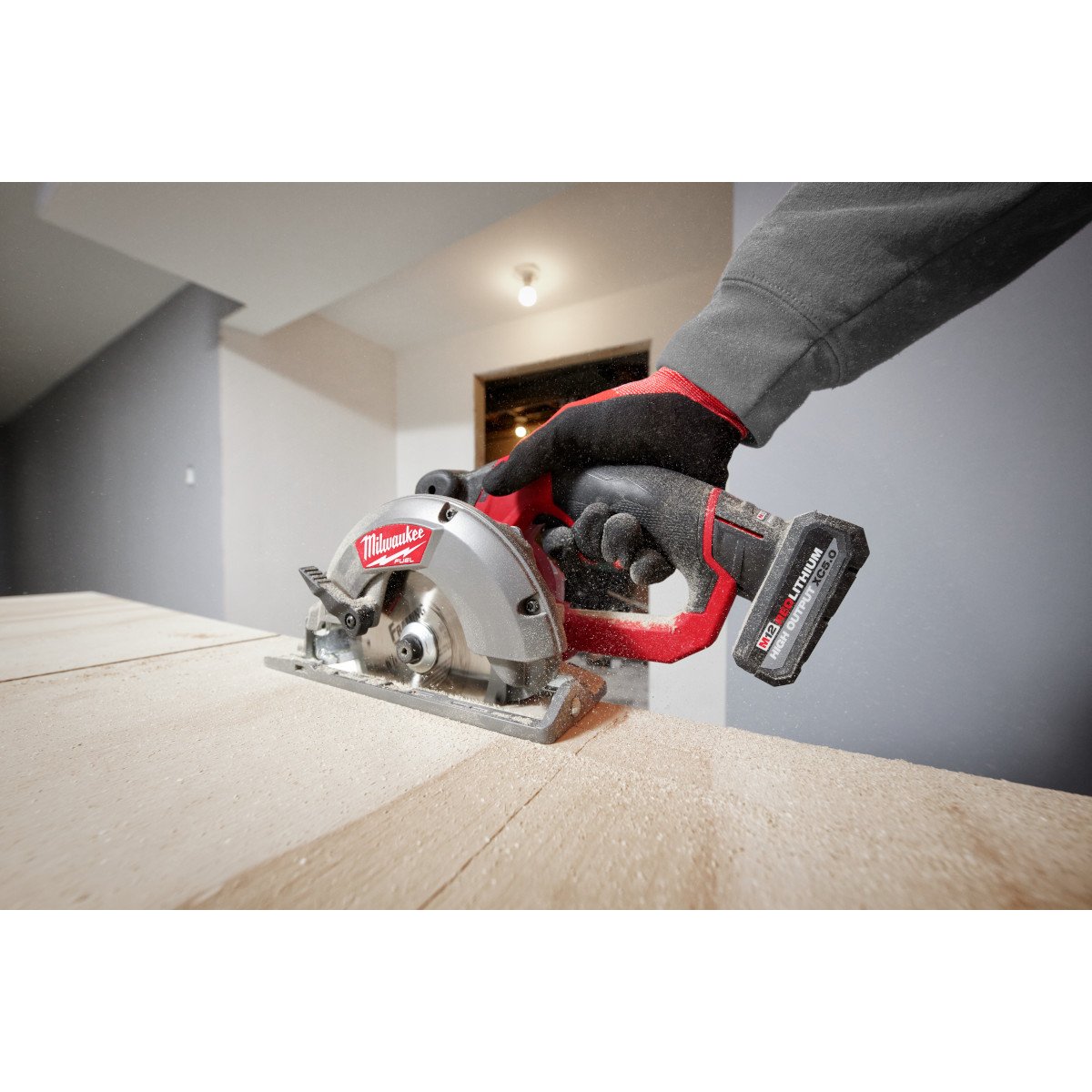 Milwaukee 48-11-2450 M12™ REDLITHIUM™ HIGH OUTPUT™ XC5.0 Battery Pack - in use