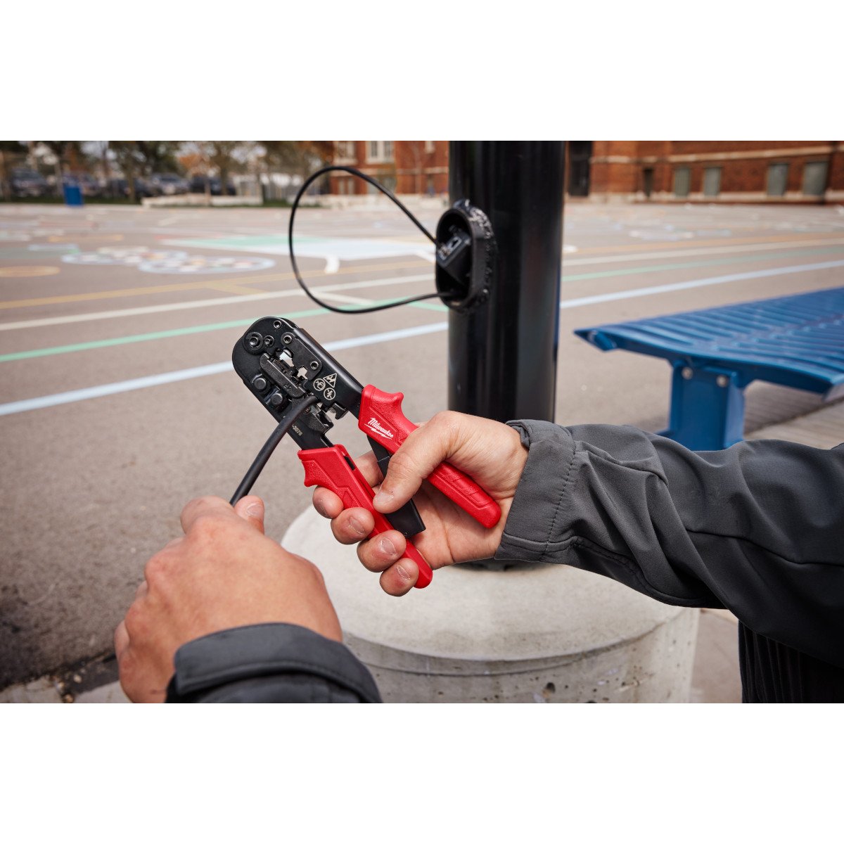 Milwaukee 48-22-3076 Ratcheting Modular Crimper & Stripper - in use
