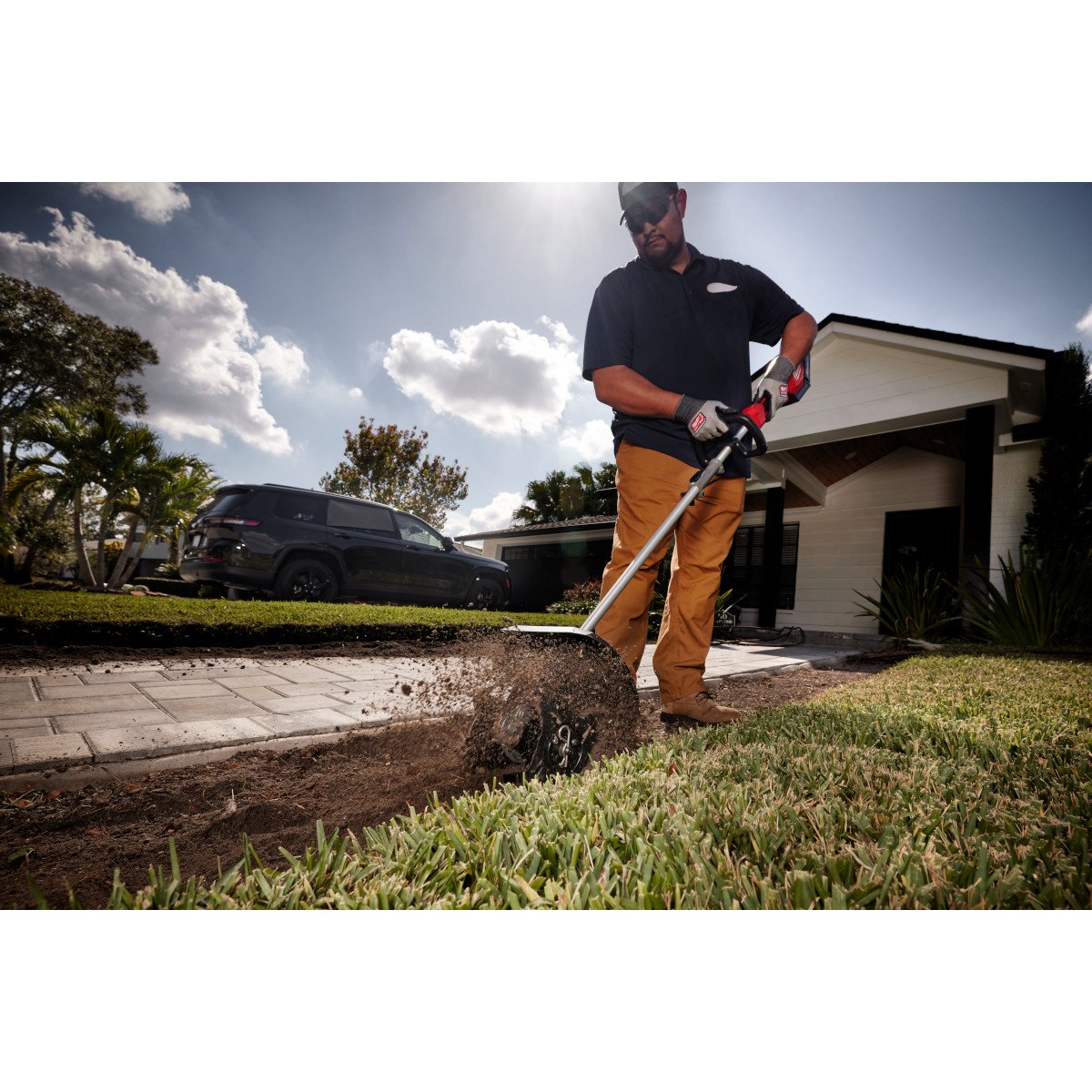 Milwaukee 49-16-2739 M18 FUEL™ QUIK-LOK™ Cultivator Attachment - in use
