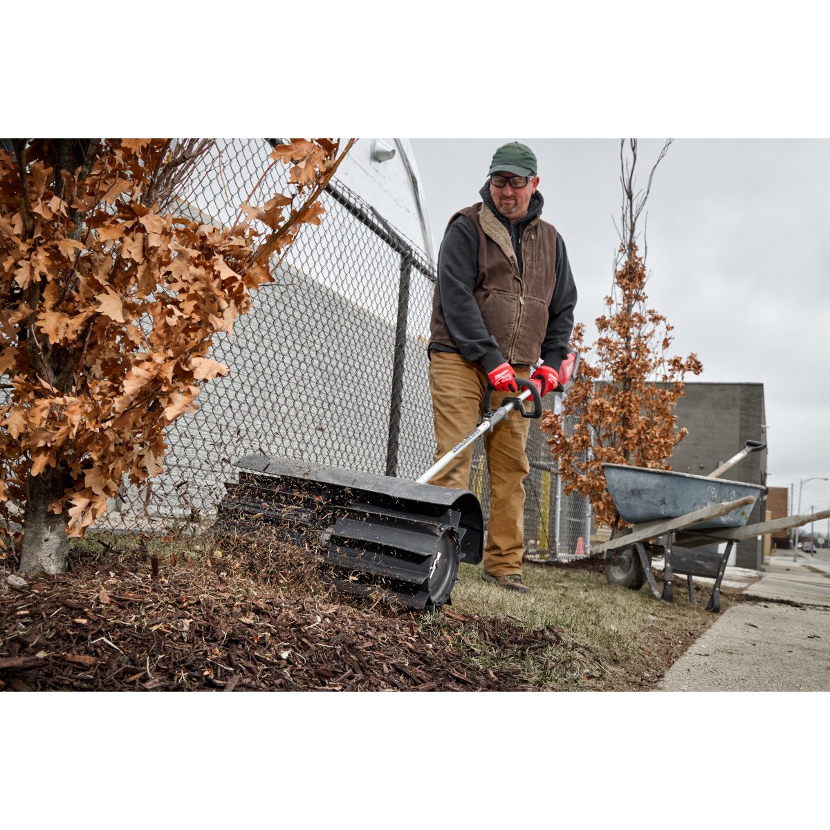 Milwaukee 49-16-2740 M18 FUEL™ QUIK-LOK™ Rubber Broom Attachment - in use