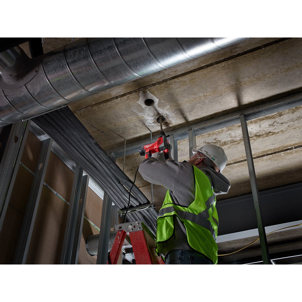 Milwaukee 5268-21 1-1/8 in. SDS Plus Rotary Hammer Kit - in use