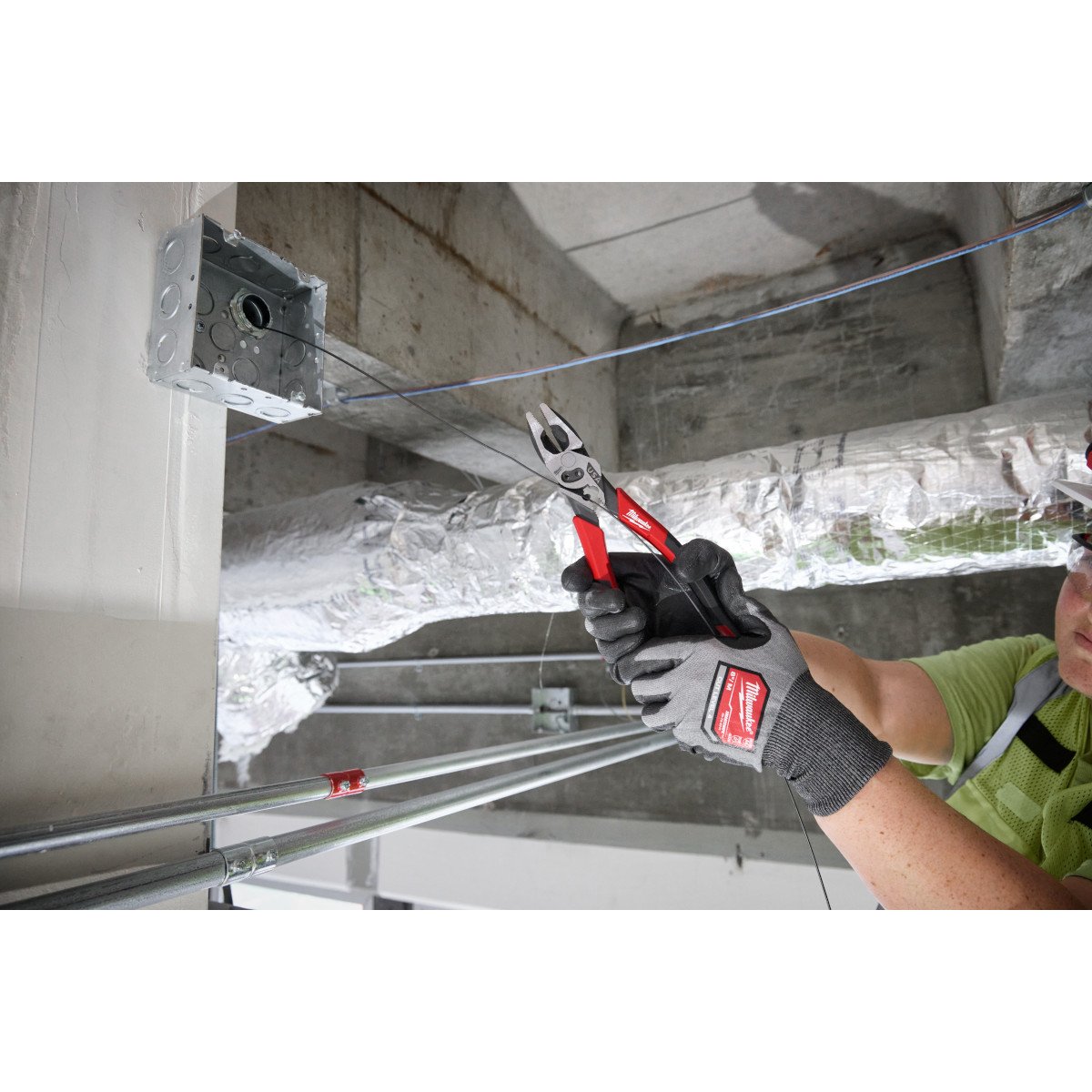 Milwaukee MT550C 9" Lineman's Comfort Grip Pliers w/ Crimper and Bolt Cutter (USA) - in use