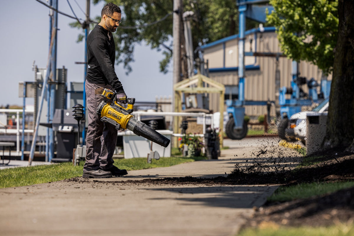 DEWALT DCBL777Y1 60V MAX High Power Brushless Blower Kit - in use