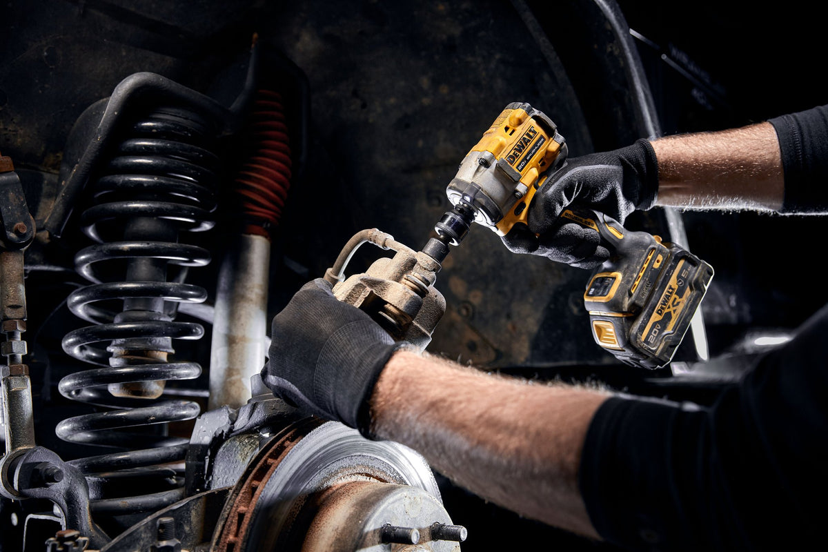 DEWALT DCF921B ATOMIC 20V MAX 1/2 in. Cordless Impact Wrench with Hog Ring Anvil (Tool Only) - in use