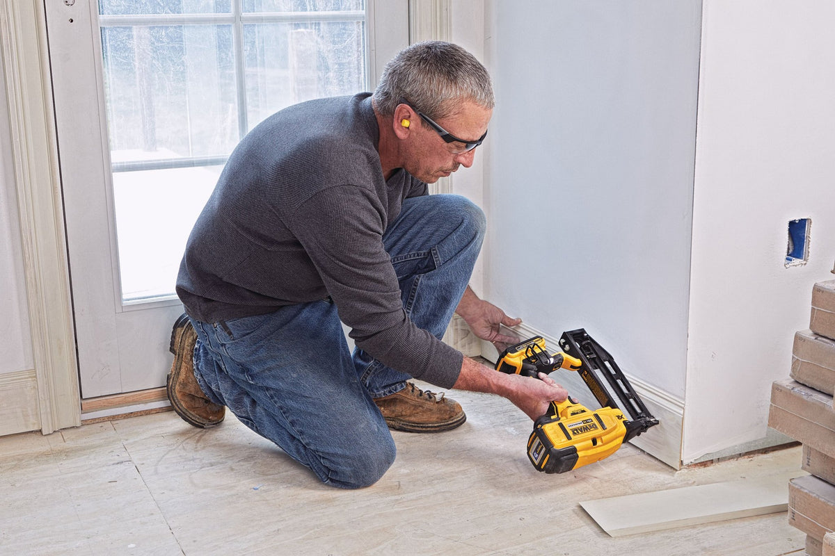 DEWALT DCN662D1 20V MAX 16GA ST FINISH NAILER KIT - in use
