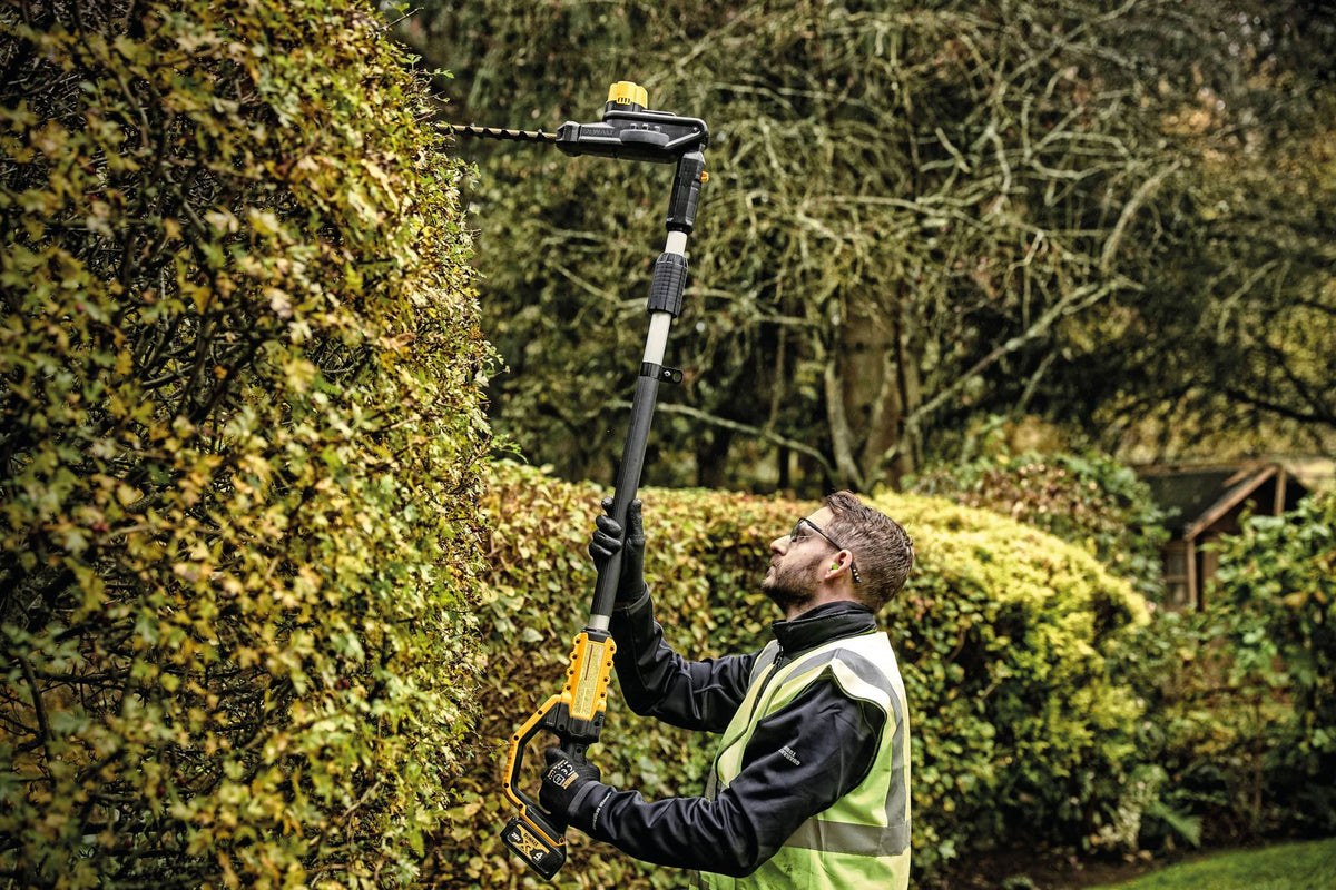 DEWALT DCPH820B 20V MAX Pole Hedge Trimmer - in use