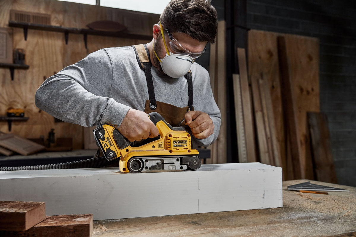 DEWALT DCW220B 20V MAX* XR® Brushless Cordless 3 in. x 21 in. Belt Sander (Tool Only) - in use