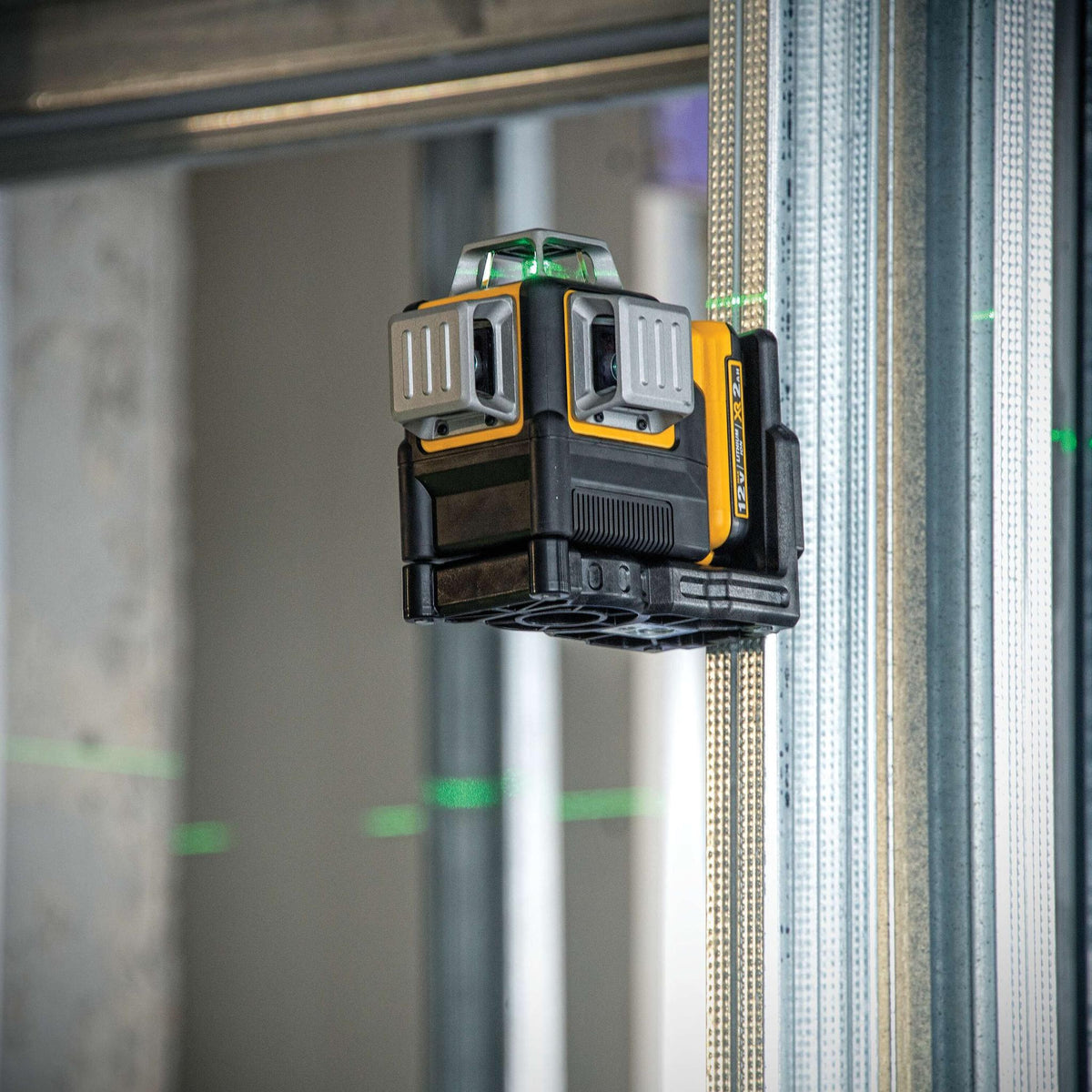 DEWALT DW089LG 12V Beam Battery, Green - in use