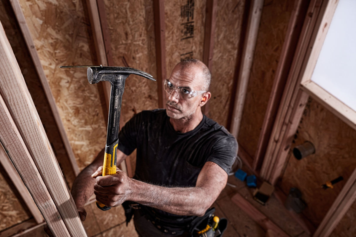 DEWALT DWHT51138X TOUGHSERIES XP 1 Pc. Steel 14 Oz. Mig Weld Framing Hammer - in use
