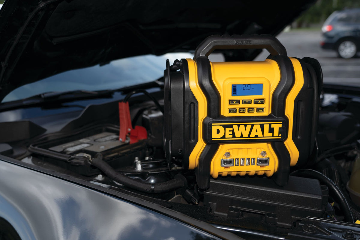 DEWALT DXAEPS14-CA 2000-Peak Amp Portable Jump Starter with Digital Compressor, USB and AC Power Bank - in use