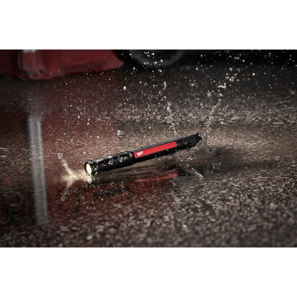 Milwaukee 2010R Rechargeable 250L Penlight w/ Laser - in use