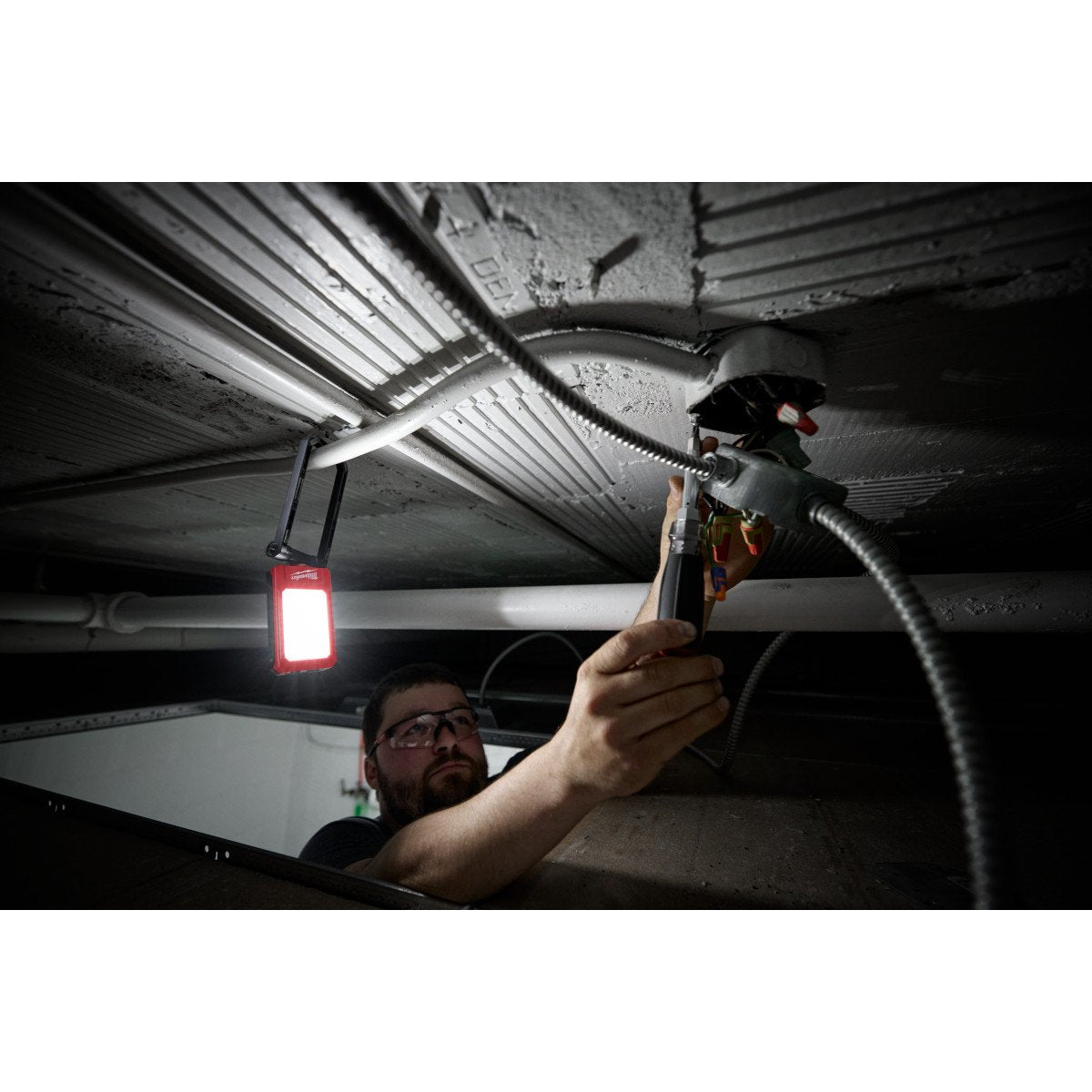 Milwaukee 2013R Rechargeable Low-Profile Magnetic Task Light - in use