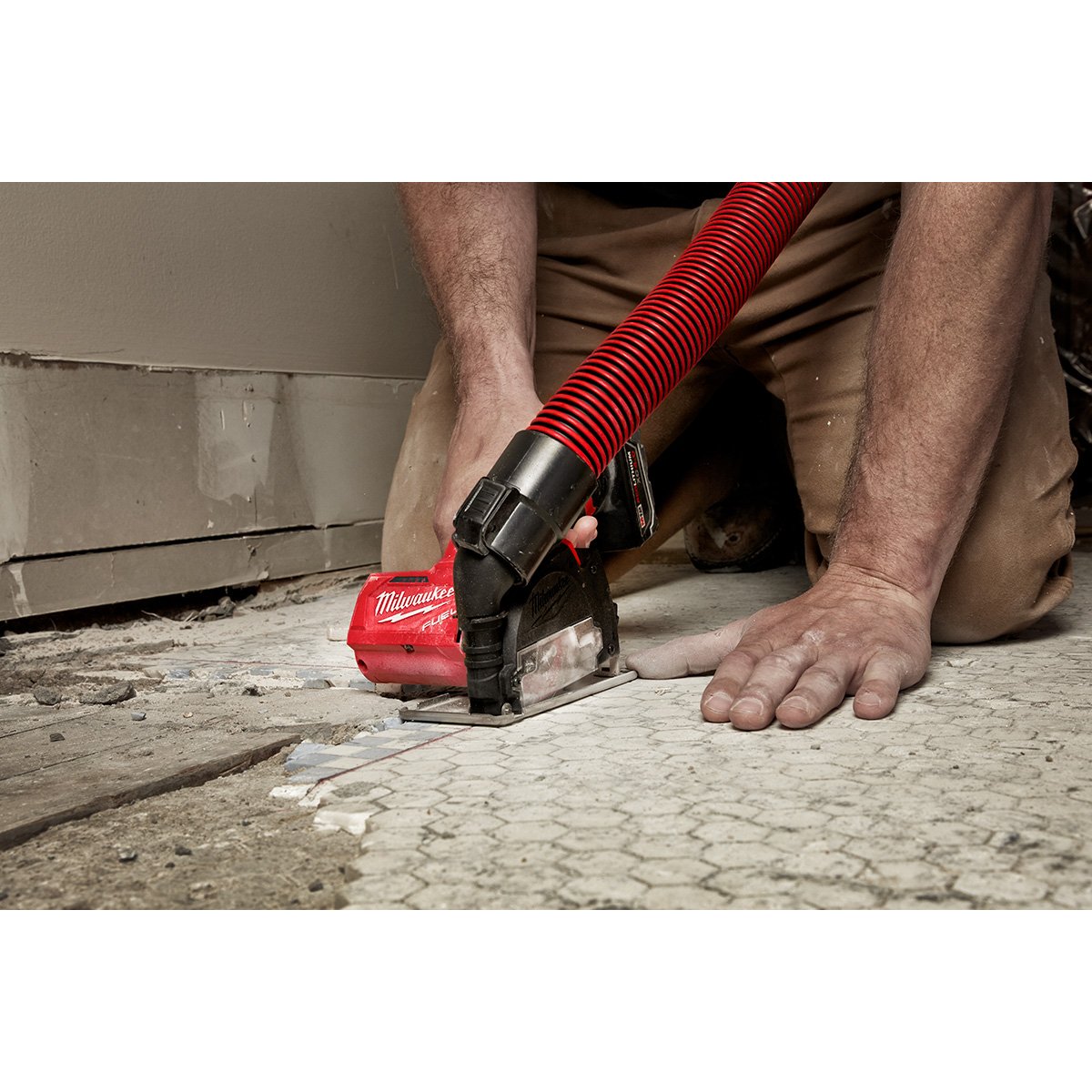 Milwaukee 2522-21XC M12 FUEL™ 3 in. Compact Cut Off Tool Kit - in use